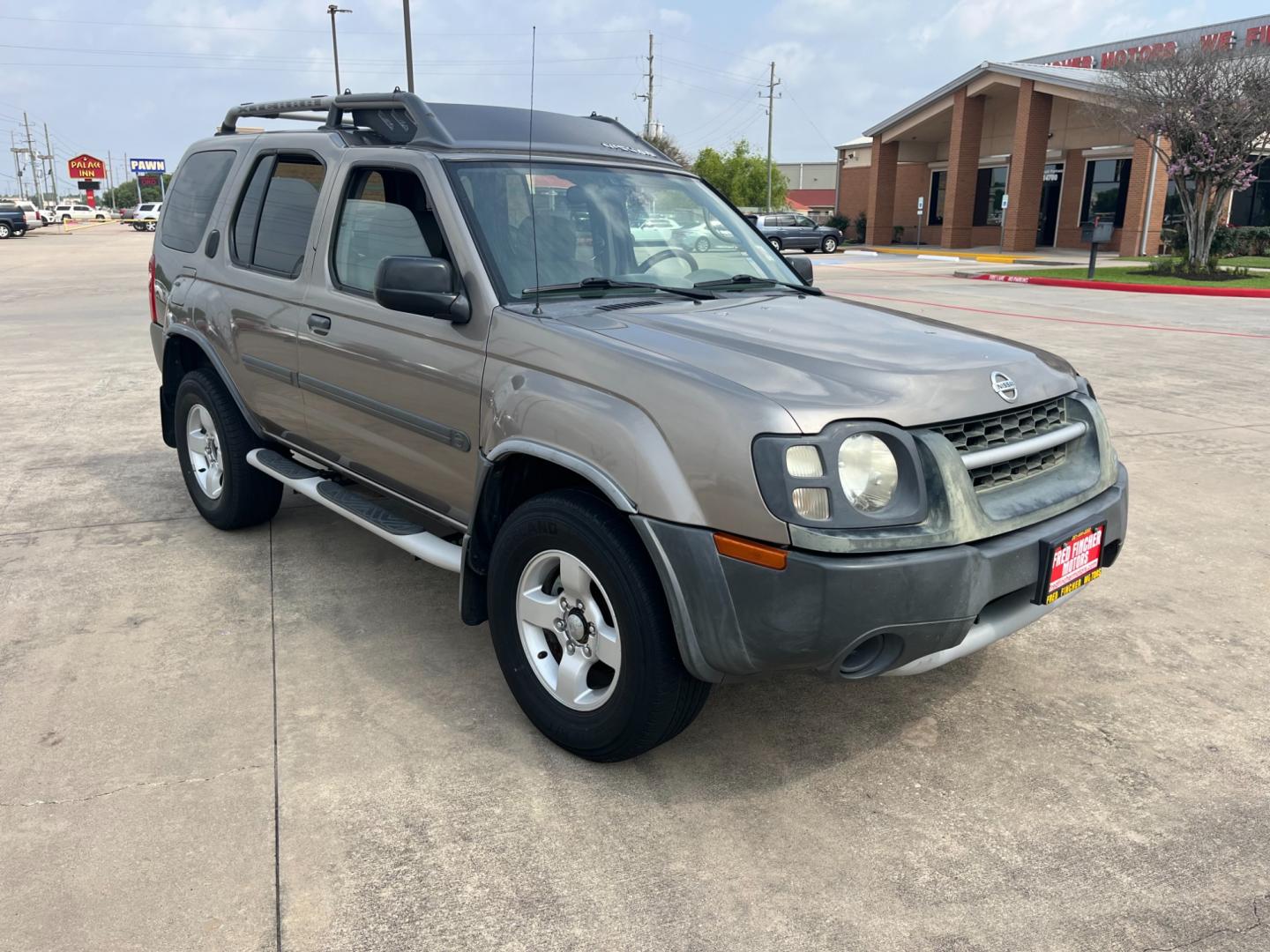 2004 GOLD /gray Nissan Xterra (5N1ED28T84C) , Automatic transmission, located at 14700 Tomball Parkway 249, Houston, TX, 77086, (281) 444-2200, 29.928619, -95.504074 - Photo#0